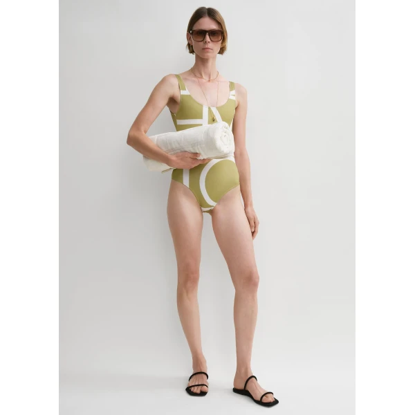 Toteme Beachwear with minimalist design at Luxury Shoes 