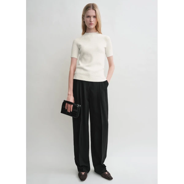 Toteme Knitwear with minimalist design at Luxury Shoes 