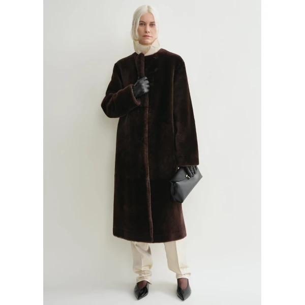 Toteme Coats with minimalist design at Luxury Shoes 