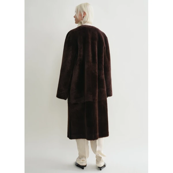 Toteme Coats with minimalist design at Luxury Shoes 
