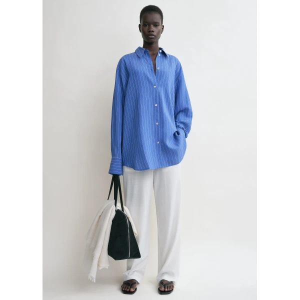 Toteme Tops with minimalist design at Luxury Shoes 