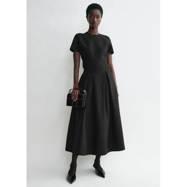 Toteme Skirts with minimalist design at Luxury Shoes 