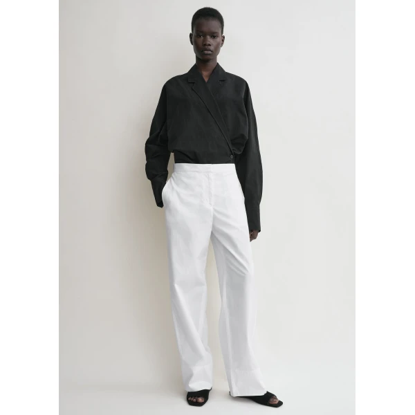 Toteme Tops with minimalist design at Luxury Shoes 