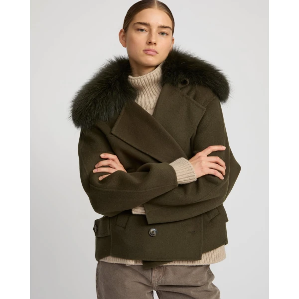Woman wearing Yves Salomon shearling fur coat – luxury outerwear at Luxury Shoes 