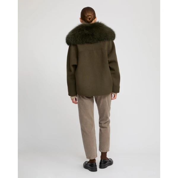 Woman wearing Yves Salomon shearling fur coat – luxury outerwear at Luxury Shoes 