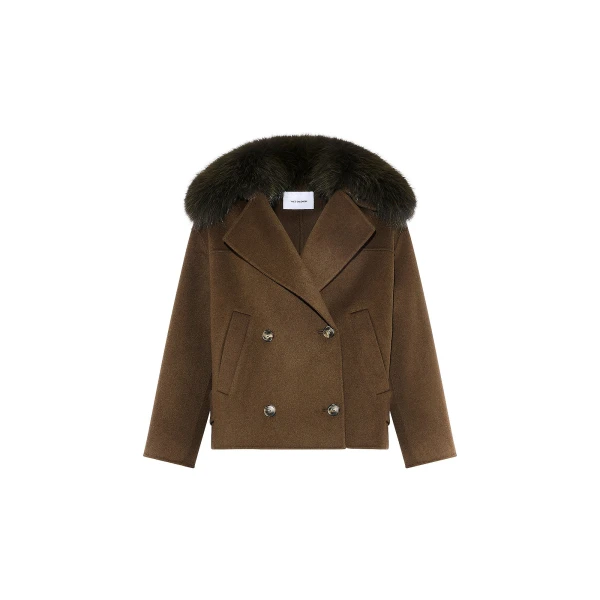 Woman wearing Yves Salomon shearling fur coat – luxury outerwear at Luxury Shoes 