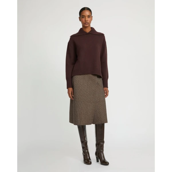 Woman wearing Yves Salomon shearling fur coat – luxury outerwear at Luxury Shoes 