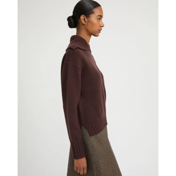 Woman wearing Yves Salomon shearling fur coat – luxury outerwear at Luxury Shoes 