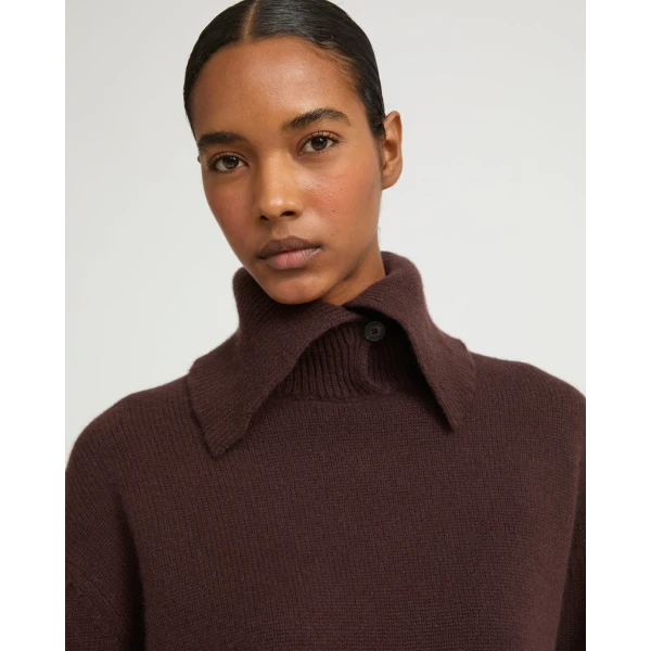Woman wearing Yves Salomon shearling fur coat – luxury outerwear at Luxury Shoes 