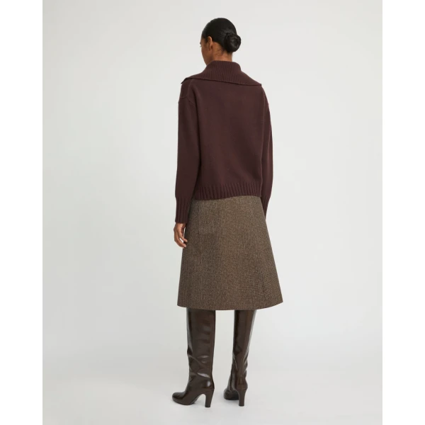 Woman wearing Yves Salomon shearling fur coat – luxury outerwear at Luxury Shoes 
