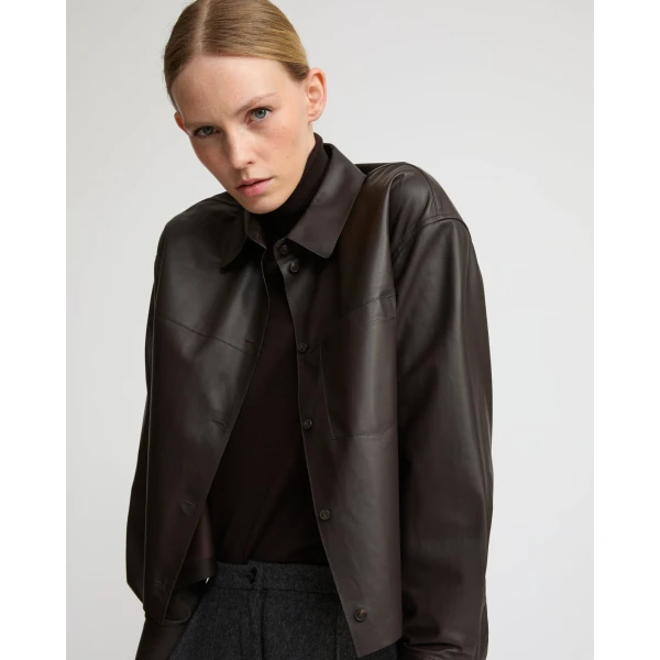 Woman wearing Yves Salomon shearling fur coat – luxury outerwear at Luxury Shoes 
