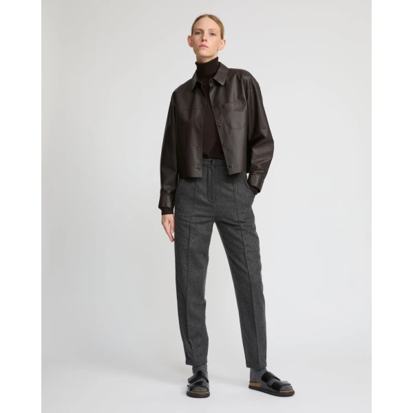 Woman wearing Yves Salomon shearling fur coat – luxury outerwear at Luxury Shoes 