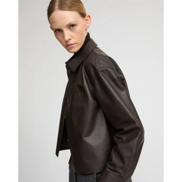 Woman wearing Yves Salomon shearling fur coat – luxury outerwear at Luxury Shoes 