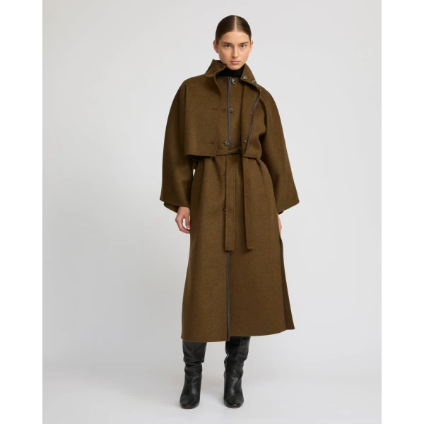 Woman wearing Yves Salomon shearling fur coat – luxury outerwear at Luxury Shoes 