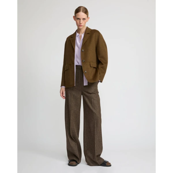 Woman wearing Yves Salomon shearling fur coat – luxury outerwear at Luxury Shoes 
