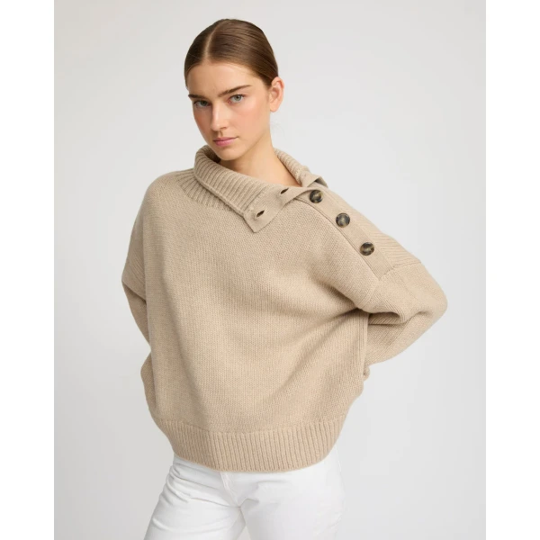 Woman wearing Yves Salomon shearling fur coat – luxury outerwear at Luxury Shoes 