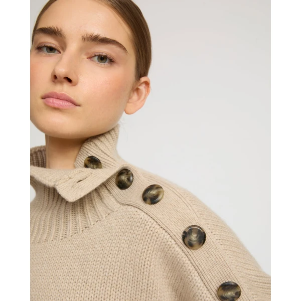 Woman wearing Yves Salomon shearling fur coat – luxury outerwear at Luxury Shoes 