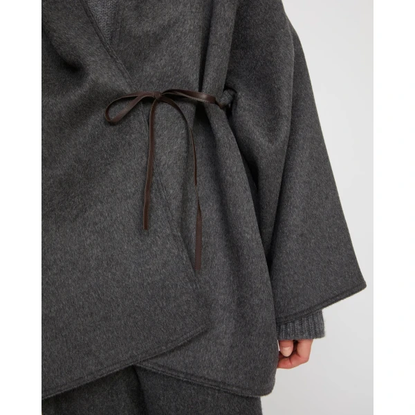 Woman wearing Yves Salomon shearling fur coat – luxury outerwear at Luxury Shoes 