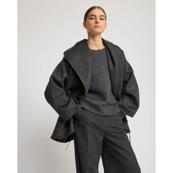 Woman wearing Yves Salomon shearling fur coat – luxury outerwear at Luxury Shoes 