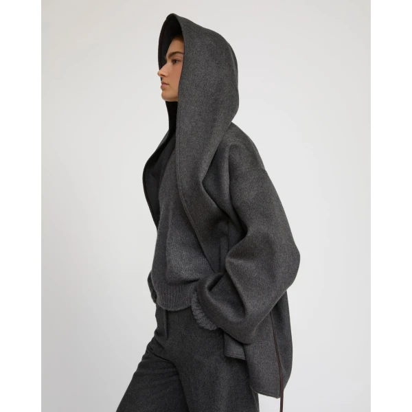 Woman wearing Yves Salomon shearling fur coat – luxury outerwear at Luxury Shoes 