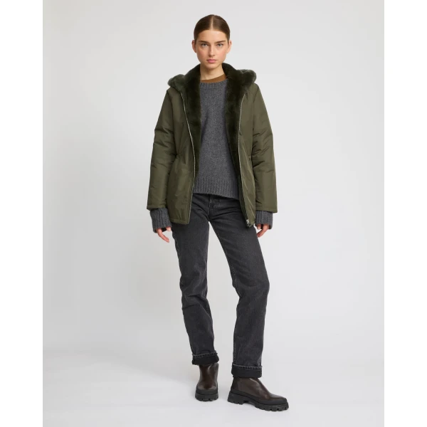 Woman wearing Yves Salomon shearling fur coat – luxury outerwear at Luxury Shoes 