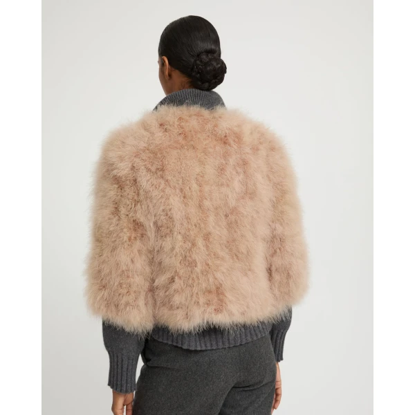 Woman wearing Yves Salomon shearling fur coat – luxury outerwear at Luxury Shoes 