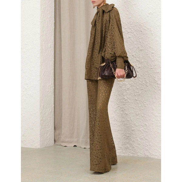 Elevate your elegance in this Zimmermann Tops   from the 2025 resort wear edit