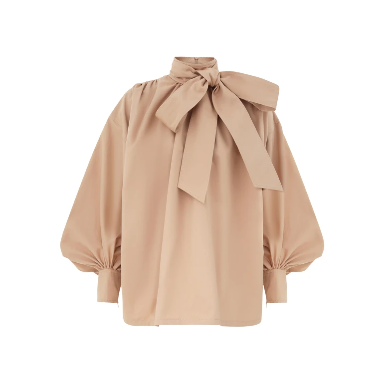 Elevate your elegance in this Zimmermann Tops   from the 2025 resort wear edit