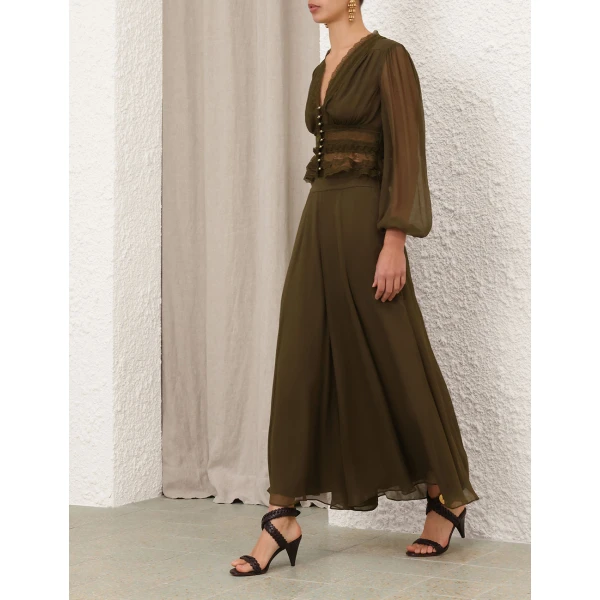 Elevate your elegance in this Zimmermann Tops   from the 2025 resort wear edit