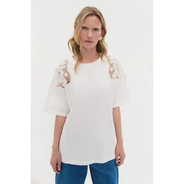 Aje Aus Tops – structured silhouette with raw femininity from Luxury Shoes 