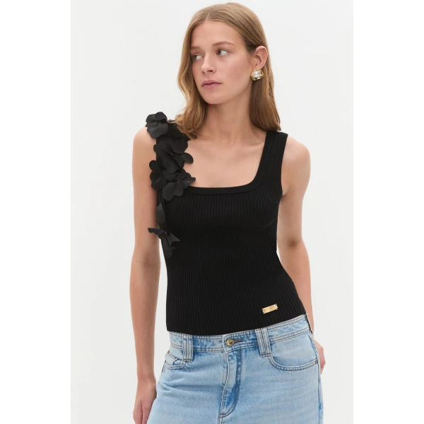 Aje Aus Tops – structured silhouette with raw femininity from Luxury Shoes 