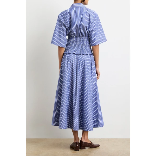 Brandon Maxwell Blue Skirts with sculptural silhouette photographed against minimal backdrop