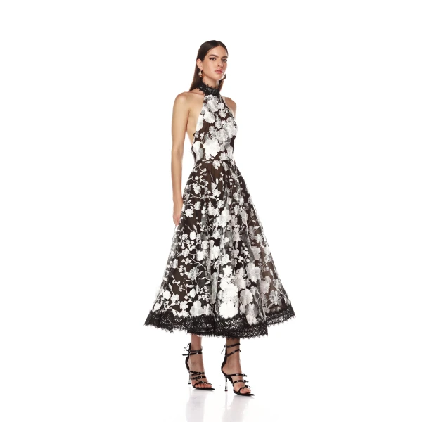 Bronx and Banco Black Greta Bouquet Black and White Midi Dress  a harmonious blend of structured elegance and timeless sophistication.