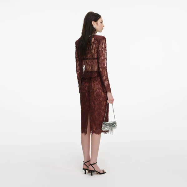 Elevate your elegance in this Self Portrait Tops  from the 2025 resort wear edit
