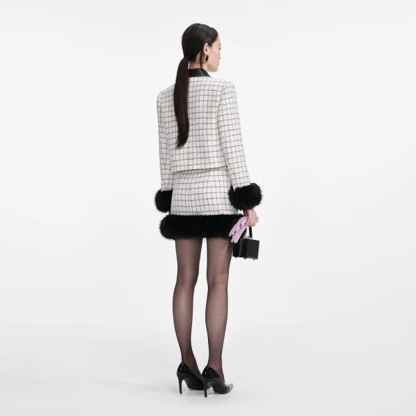 Elevate your elegance in this Self Portrait Skirts Mini Dress from the 2025 resort wear edit