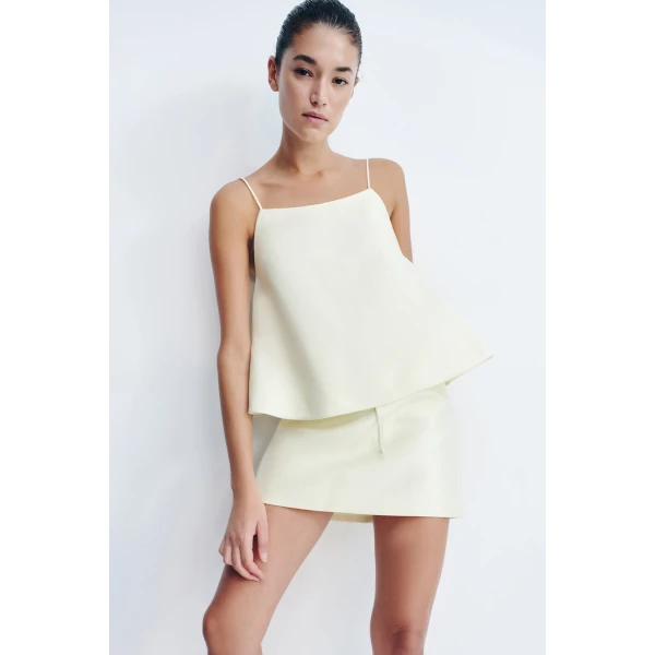 Square neck flared cami in yuzu in a luxurious cotton sateen blend.