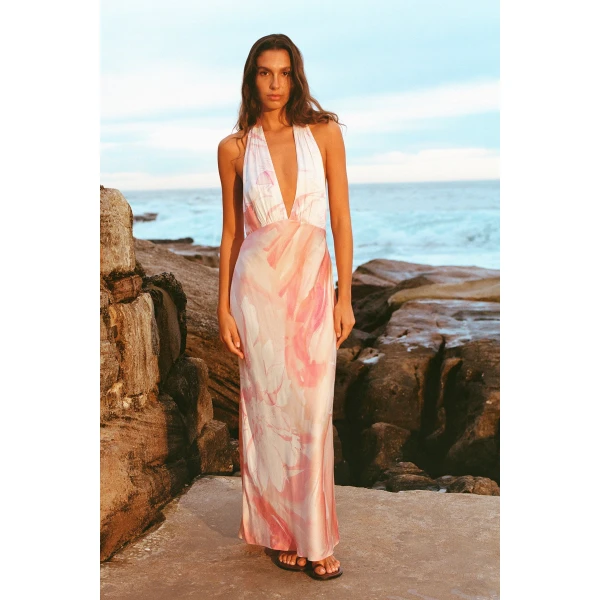 Plunged halter neck maxi dress in the petal sunrise print in a LENZING  ECOVERO  Viscose with a luxurious matte finish.