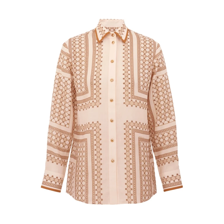 Elevate your elegance in this Zimmermann Tops   from the 2025 resort wear edit