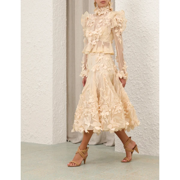 Elevate your elegance in this Zimmermann Tops   from the 2025 resort wear edit