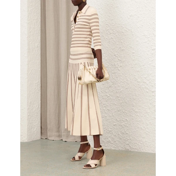 Elevate your elegance in this Zimmermann Tops   from the 2025 resort wear edit