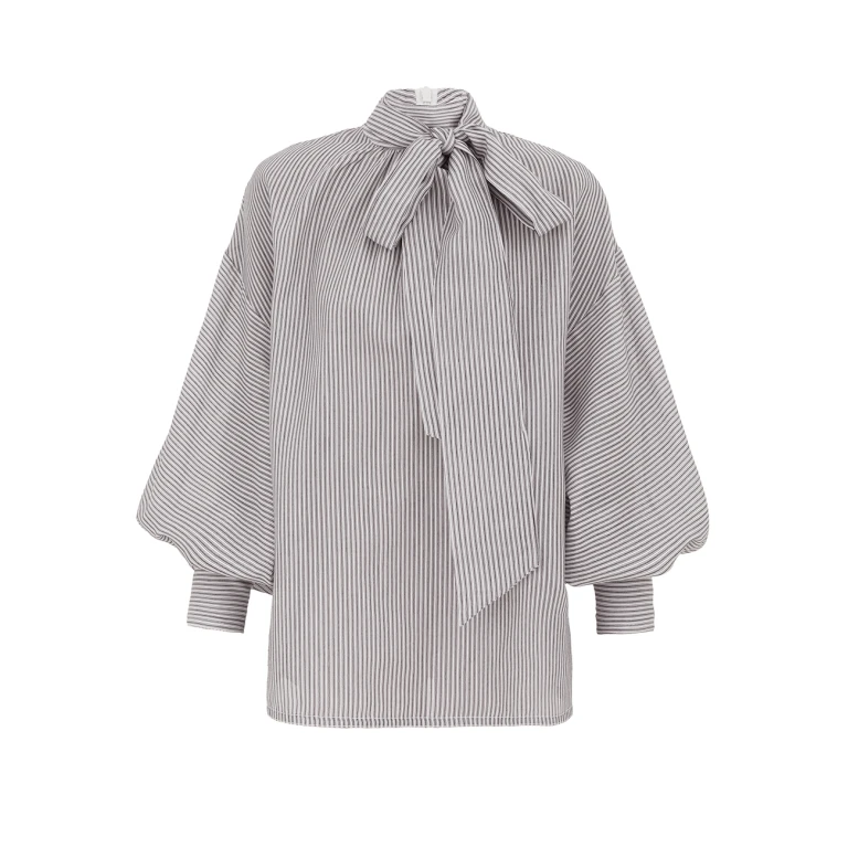 Elevate your elegance in this Zimmermann Tops   from the 2025 resort wear edit