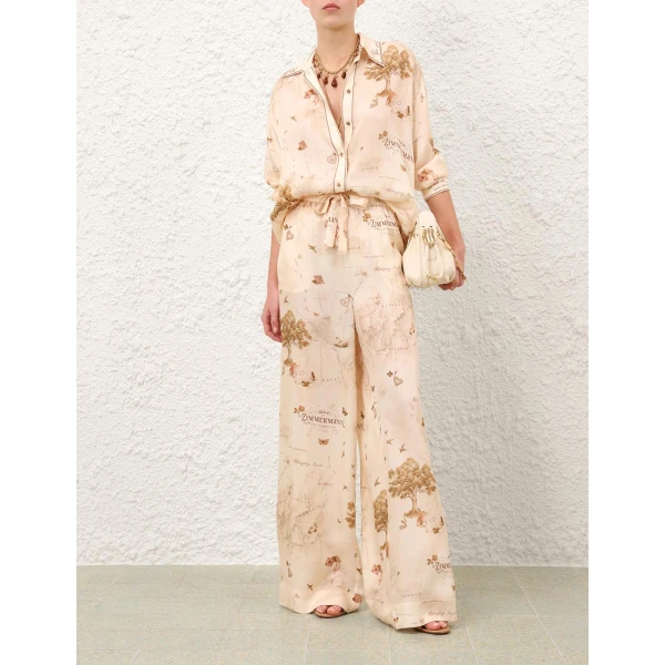 Elevate your elegance in this Zimmermann Tops   from the 2025 resort wear edit