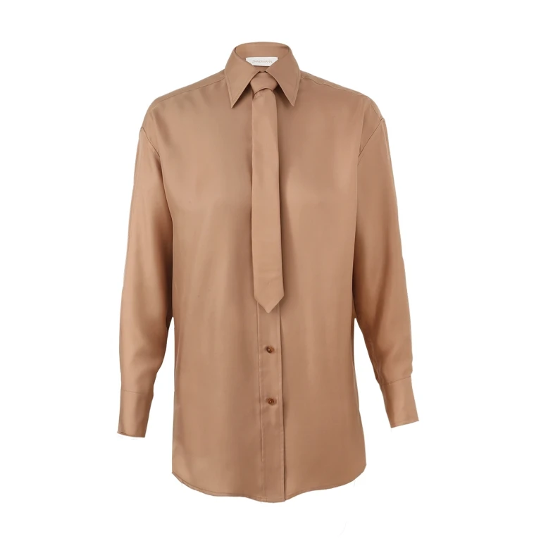 Elevate your elegance in this Zimmermann Tops   from the 2025 resort wear edit