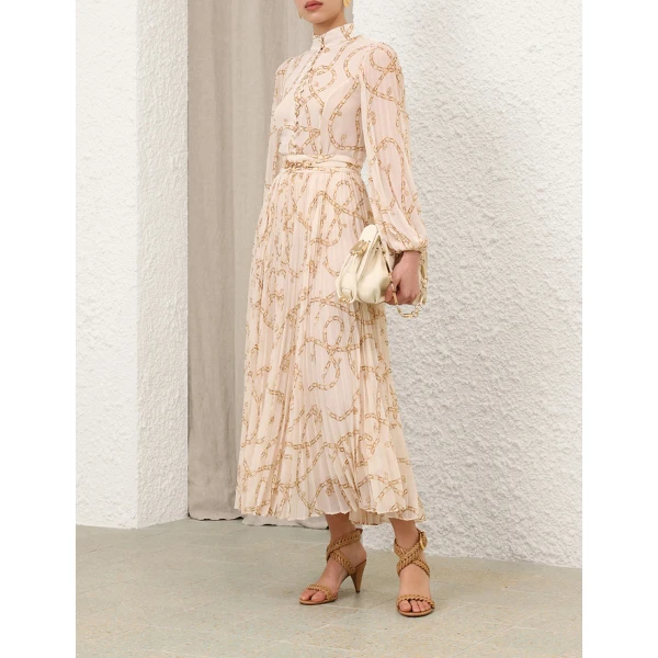 Elevate your elegance in this Zimmermann Tops   from the 2025 resort wear edit