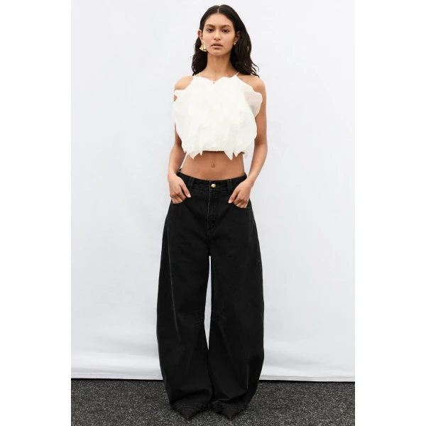 Aje Aus Pants – structured silhouette with raw femininity from Luxury Shoes 