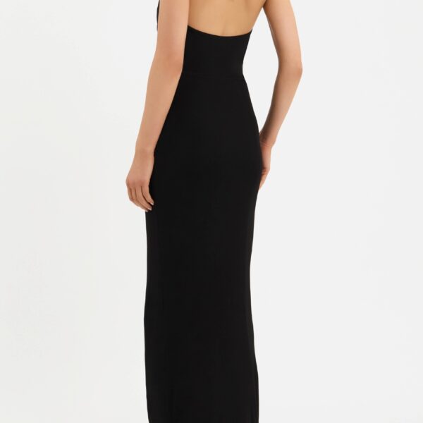 cinched waist and low scoop back sculpt a feminine silhouette