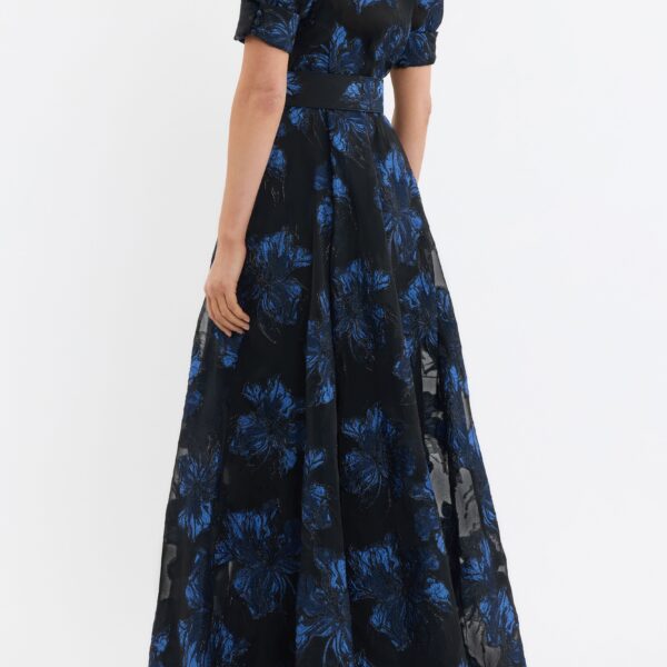 while the circular maxi skirt flows gracefully for ease of movement. Perfect for your next event