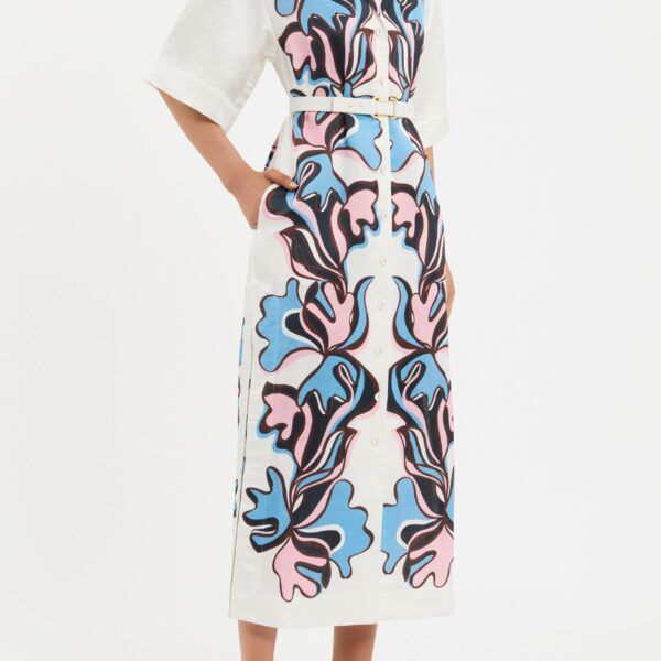 while front and back yoke detailing add a polished touch. Side splits at the hem elevate the chic midi skirt
