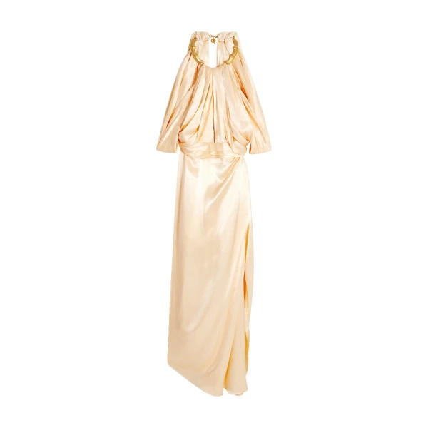 Schiaparelli black dress featuring gold bamboo shaped hardware straps and buttons