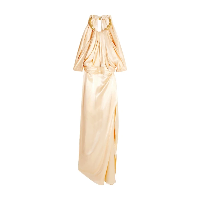Schiaparelli black dress featuring gold bamboo shaped hardware straps and buttons